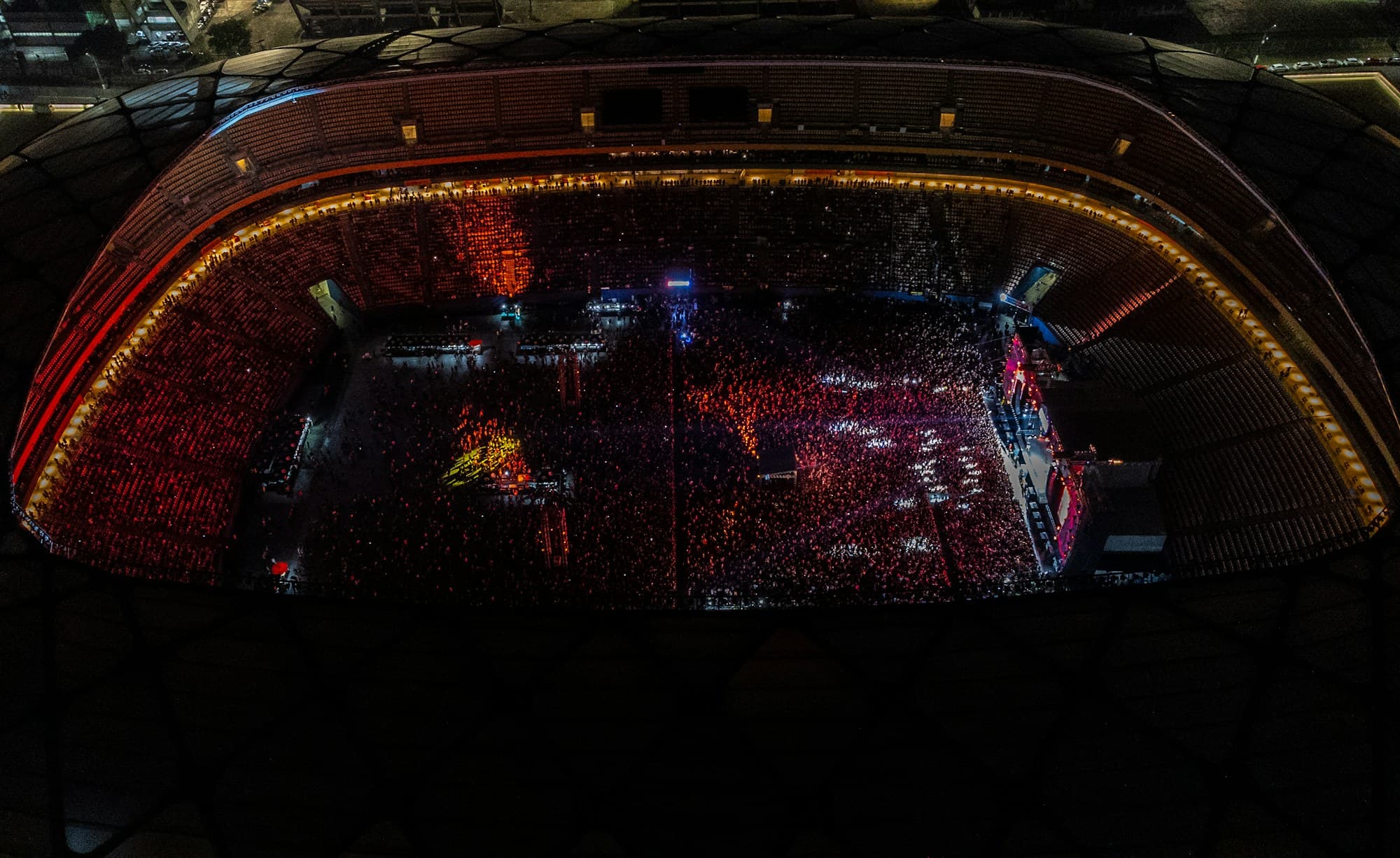 An aerial view over an audio-visual event production in progress
